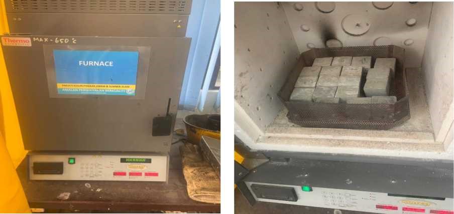 A machine with a box of bricks

Description automatically generated with medium confidence